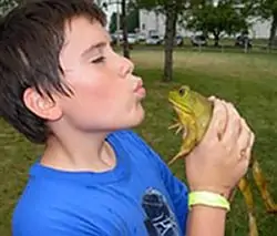 Boy at Camp with Frog